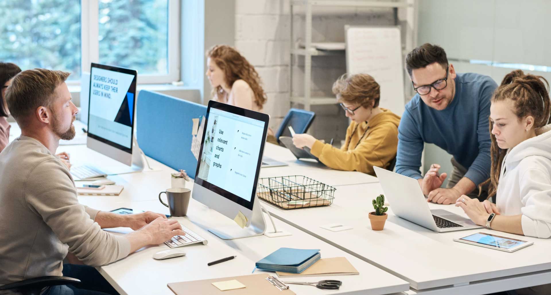  "SHDigiWorld digital experts collaborating in a startup environment"